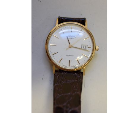 A 9ct gold Rotary gentlemans quartz wristwatch,&nbsp;with ETA 555 415 movement, on brown leather strap, 33mm. 