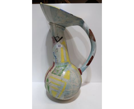 A large ceramic jug, with stylised decoration, signed Sheila Houston and dated 1986 Condition Report:Available upon request
