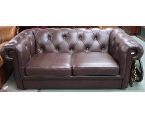 A contemporary brown leather button back upholstered club style two seater sofa, 73cm high x 185cm wide x 100cm deep Conditio