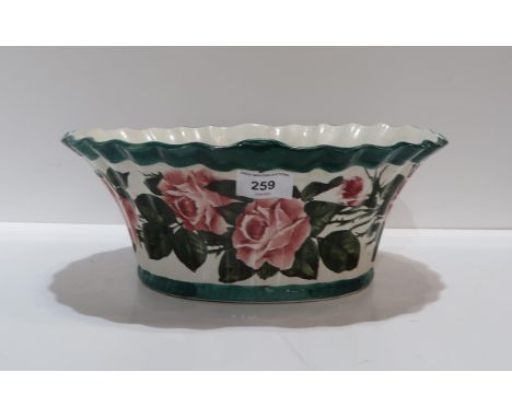 A Wemyss fluted bowl, decorated with cabbage roses, printed and impressed marks to base Condition Report:probably a basket an