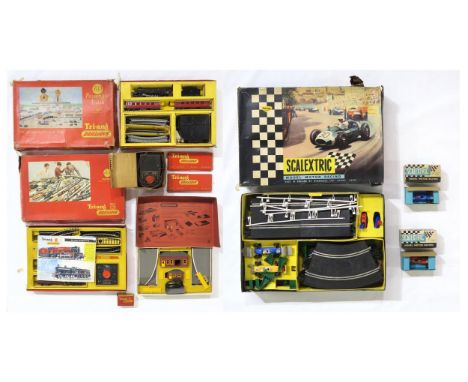 Boxed Tri-ang 00-gauge model railway sets and components, comprising an R3.A Electric Railway set, RO Electric Passenger Trai