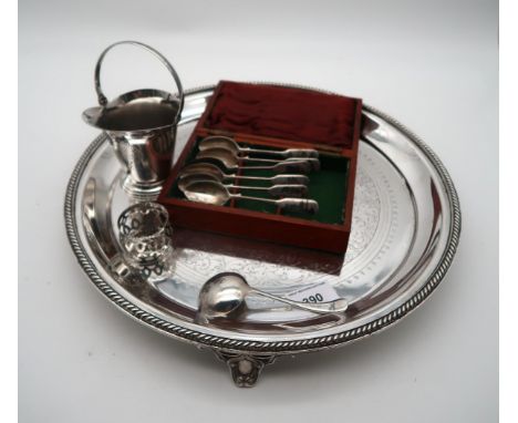 A collection of EPNS including a salver, a cream jug, a ladle, napkin ring, and a set of six Persian white metal niello spoon