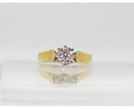 An 18ct gold illusion set diamond solitaire ring, size I1/2, weight 3.7gms Condition Report:Available upon request