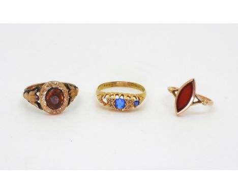 An 18ct (af) gold blue gem and diamond chip ring, size S, weight 2.9gms, a 9ct gold carnelian set ring, size K, and a yellow 