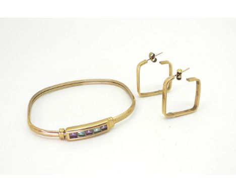 A 9ct gold square shaped bangle set with amethyst and blue topaz, with a pair of square hoop earrings weight together 12.6gms