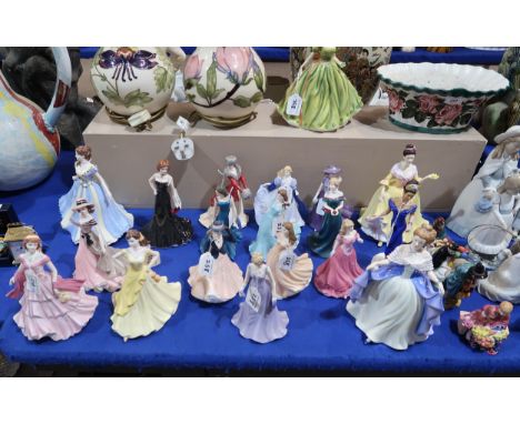 A large collection of ceramic lady figures including Coalport, Royal Worcester and Royal Doulton (22) Condition Report:Availa