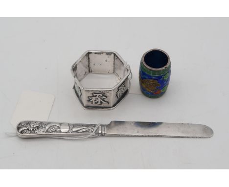 A Chinese export silver knife, by Wang Hing, the handle with cast decoration of a dragon, a hexagonal napkin ring, make's mar