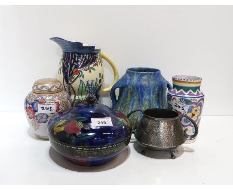 A collection of decorative ceramic including Reubens Ware pomegranate decorated pot and cover, Poole pottery vase, Charlotte 