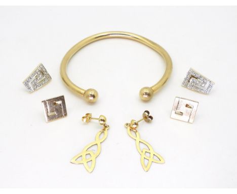 A 9ct gold bangle together with three pairs of yellow metal earrings, weigh combined 18.9gms Condition Report:Available upon 