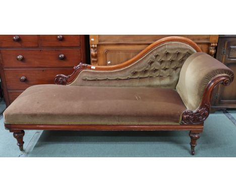 A Victorian mahogany chaise longue with velvet upholstery on turned supports terminating in ceramic casters, 93cm high x 185c