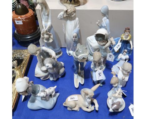 A large collection of figures including Nao, Lladro, Royal Doulton and Coalport Condition Report:Available upon request