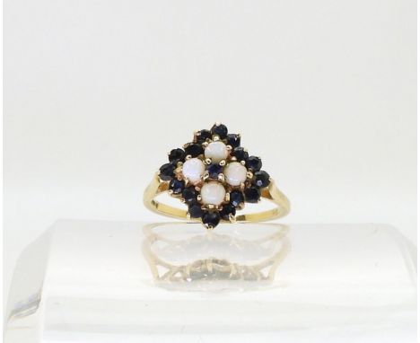 A 9ct gold sapphire and opal cluster ring, size L1/2 Condition Report:Available upon request