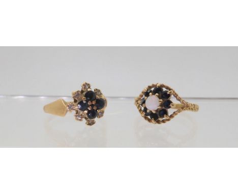 A 9ct gold retro sapphire and diamond accent cluster ring, hallmarked London 1976, size J1/2, together with a 9ct gold opal a