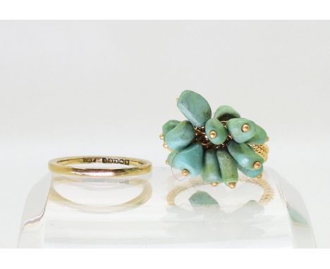 An 18ct gold and turquoise ring, size M, together with a 9ct gold wedding band, size K1/2, weight total 6.4gms Condition Repo