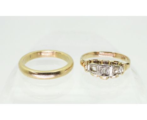 A 9ct clear gem set vintage ring (one gem missing) size M1/2 and a yellow metal wedding ring, size M, weight 5.2gms Condition