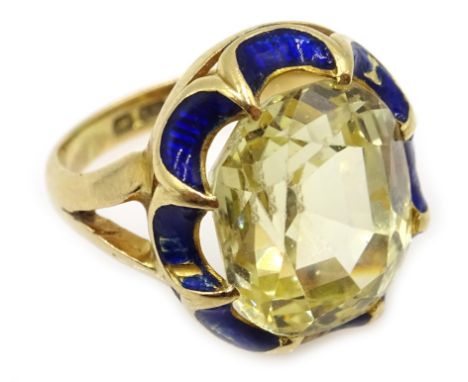 Yellow sapphire and blue enamel 18ct gold ring, Chester 1913 Condition Report Sapphire 1.3cm x 1cmsize J6gmsome enamel rubbed