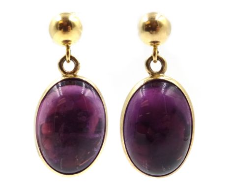 Pair of 9ct gold (tested) cabochon amethyst pendant earrings Condition Report Approx 4.1gm, the butterfly backs are 18ct gold