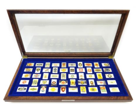 Fifty silver and enamel ingots `The Official Emblems of the Worlds Greatest Automobiles`by Franklin Mint 38 oz cased Conditio