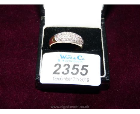 An 18ct gold Ring set with thirteen diamonds, size S.  
