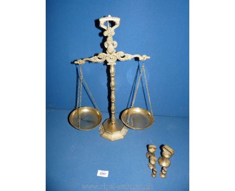 An ornamental Brass scales and weights