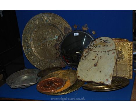 A quantity of brass including plates, trays and a longcase clock mechanism