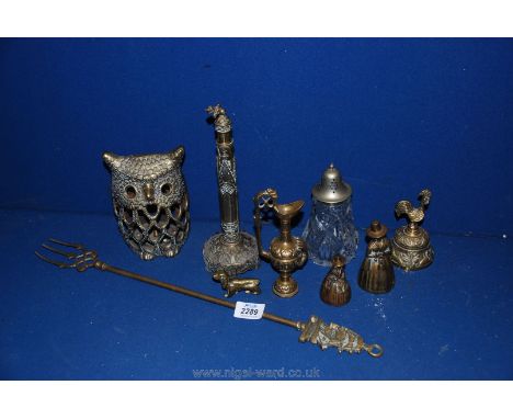 A quantity of brass to include brass bells two being Welsh lady and the other cockerel, candle snuffer, ornament jug, ornamen