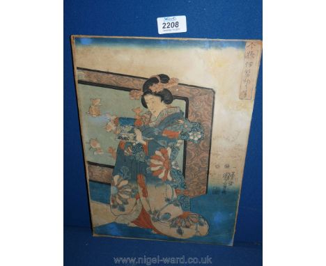 A Japanese woodblock Print of Geisha with pillow signed with stamps, Kuniyoshi c1845 written on backing board, 10" x 14".