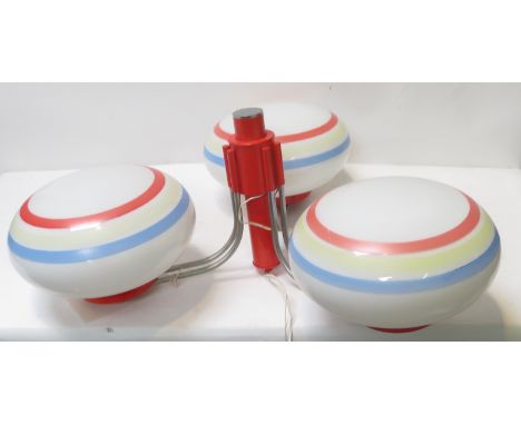 A retro three branch ceiling pendant light fitting with striped decorative glass shades