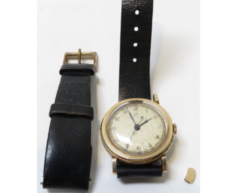 Omega, a 9 carat gold gentleman's mechanical wrist watch, the white dial with black Arabic numerals, outer seconds chapter, b