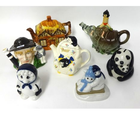Seven china ornaments including Disney Tea Pot, Jungle book, Wade tea pot, Wade Panda money box, Wade 1996 Xmas Snow Men etc