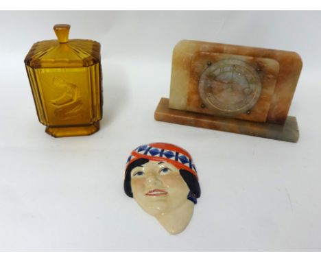 An Art Deco mantle clock, a Sowerby Pandora's Box Art Deco uranium glass lidded biscuit barrel, 20cm (h) and a Kevin Francis 