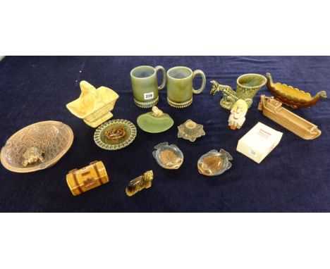 A collection of small Wade ornaments to include ashtrays, mugs etc.