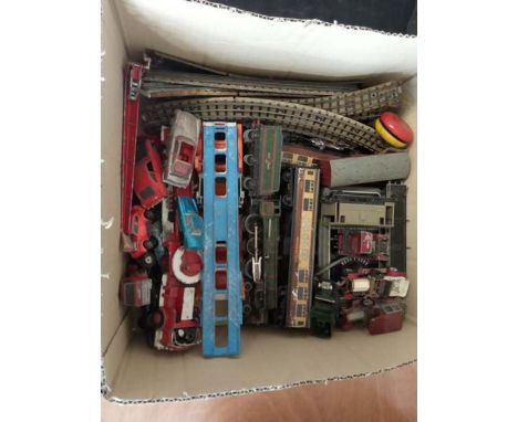 Assorted vintage toy cars and model railway items, Hornby Dublo etc.