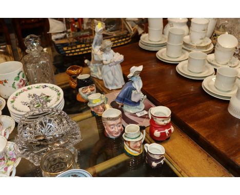 A quantity of various character jugs to include Goebel, and three Lladro figures 