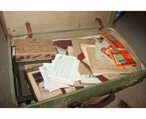 A vintage suitcase containing newspapers from 1940-1960, photo albums, documents and ephemera etc.