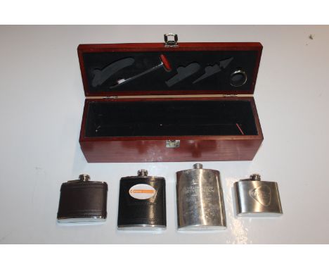 A wine box containing hip flasks, wine thermometer, bottle collar etc.. 