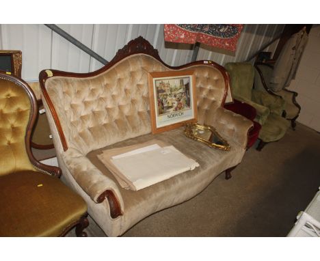 A Victorian button back upholstered sofa