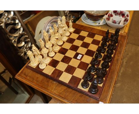 A chess board and pieces 