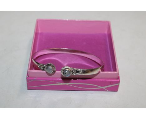 A 925 silver and moon stone style bangle