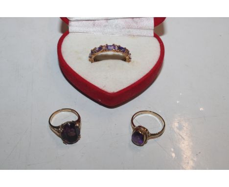 A 9ct gold ring set with amethyst coloured stone, ring size M, approx. total weight 1.8gms, another 9ct gold ring set with am