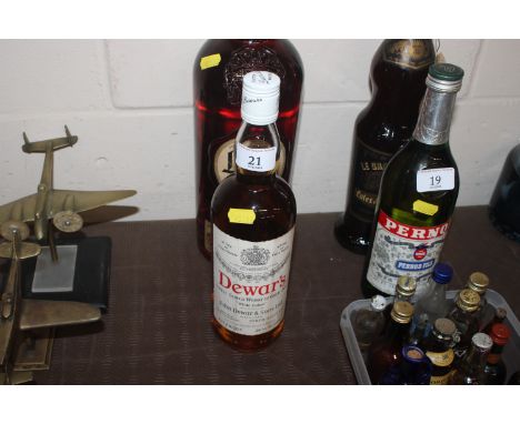 A vintage 1960's bottle of Dewars Scotch Whisky