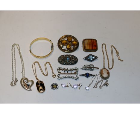 A rolled gold bangle; yellow metal brooch; a cameo pendant; paste set buckle and other jewellery