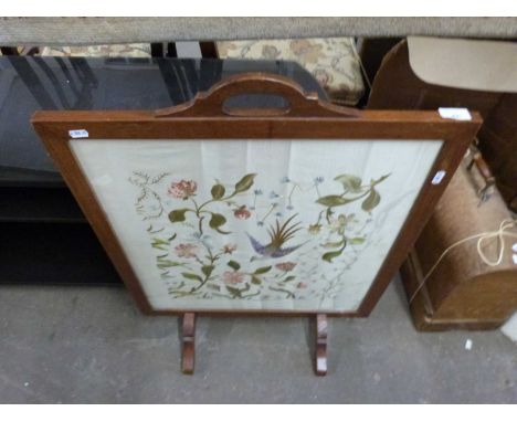 Needlework fire screen