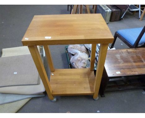 Modern light oak two tier table on wheels
