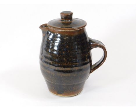 LEACH POTTERY. A Leach Pottery Standard Ware coffee pot. Height 20cm. Pottery mark.  Please note that all items in this aucti