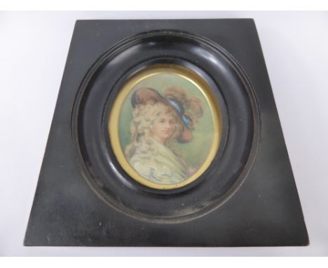 An Antique Portrait Miniature, depicting a young woman, presented in an ebonized frame, label to verso Henry Mercot Longacre 