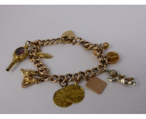 A Lady's Vintage 9ct Yellow Gold Identity Bracelet, heart shaped clasp, with ten gold charms, approx 28 gms