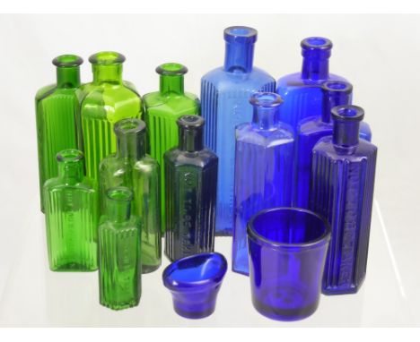 A Quantity of Vintage Blue and Green Medicine Bottles, including an eye bath.
