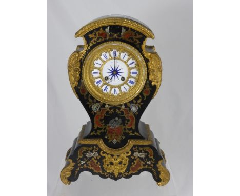 A Late 19th Century Henri Marc Paris Mantel Clock, the cast gilt dial with blue enamel Roman numerals,red tortoiseshell, with