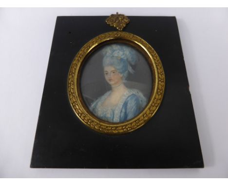 An Antique Portrait Miniature, painted on ivory, label to verso reads 'Queen Christina of Sweden', in the original ebonised f